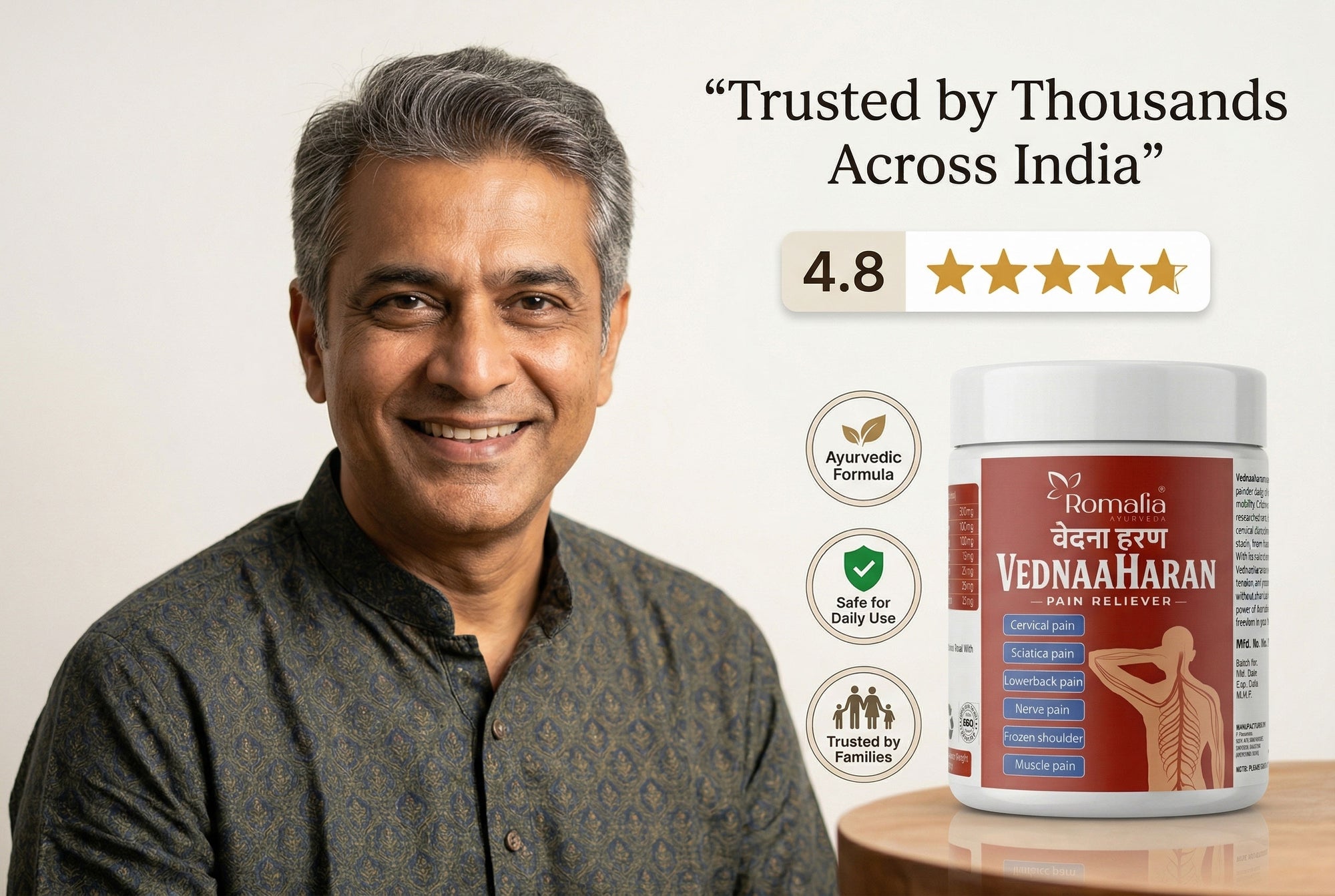 Man smiling with a container of Vednaa Haran supplement on a table, featuring product branding and customer trust rating.